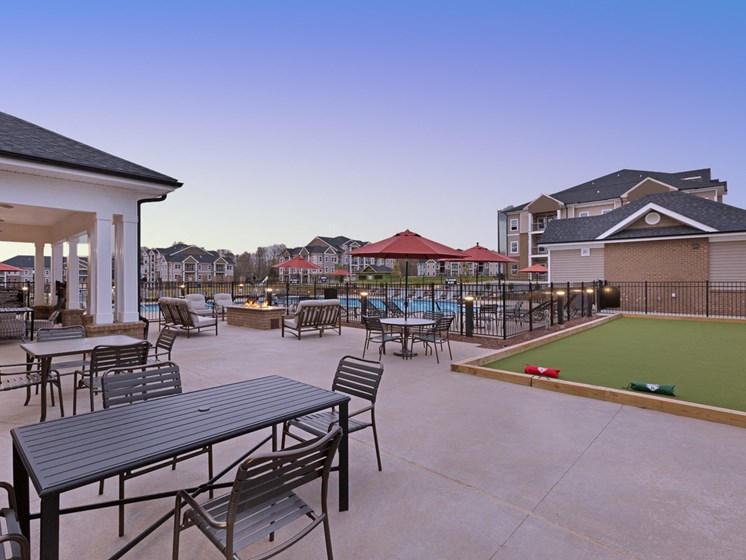 Relaxing Pool And Outdoor Entertainment Area at Abberly Avera Apartment Homes by HHHunt, Manassas, VA, 20109